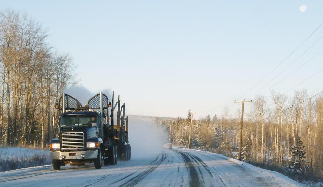 semi-truck-snowy-hill