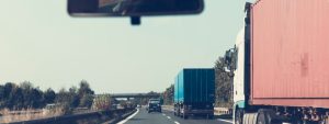 semi trucks on a highway backup camera