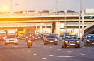 Motorcycle navigating freeway traffic